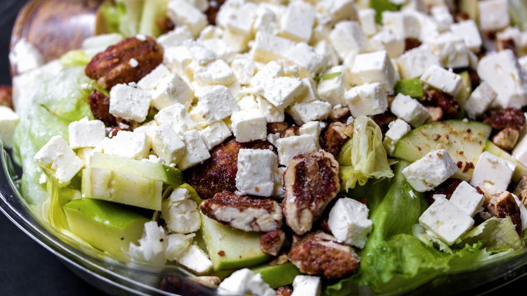 Waldorf Salad · Candied walnuts sliced granny smith apples and feta cheese over iceberg lettuce with balsamic vinaigrette.