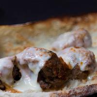 The Parms Sandwich · Chicken, eggplant, or meatball.