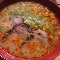 Negi Ramen · Spicy pork broth and ramen noodles with roasted pork bits and extra scallion.