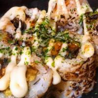Yaki Unagi Sushi Roll · Lightly grilled eel and avocado sushi roll with special teriyaki sauce.