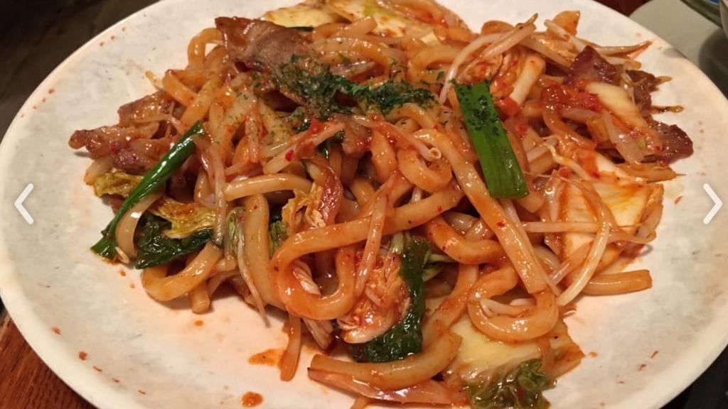 Kimchi Yaki Udon · Pan fried kimchi , udon with pork and vegetables spicy.