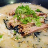 Tonkotsu Chazuke · Rice in a pork soup base with sliced pork.