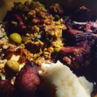 Feijoada For One · Feijoada (black beans stew with dry beef, pork sausage, pig feet and bacon) served with rice...