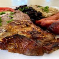 Combination Of Pork Shoulder And Pork Sausage · Customer Choice 4 sides (Black Beans, Pinto Beans, White Rice, Brown Rice, Mashed Potato, Sw...