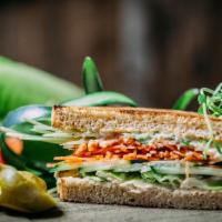 Hummus Tahini Sandwich · Romaine lettuce, carrot, cucumber, and bean sprouts.