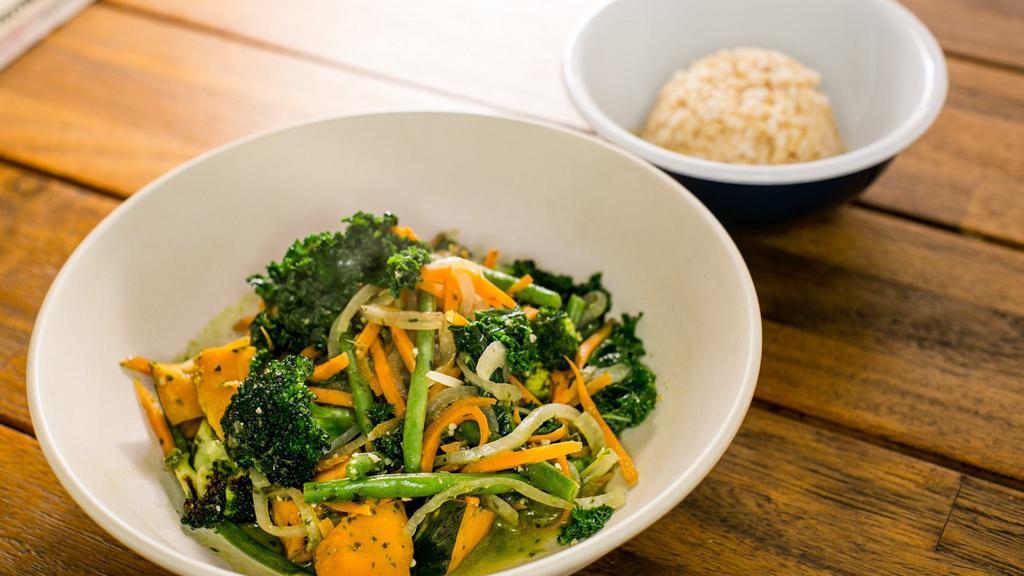 Vegetable Pesto Bowl · String beans, kabocha, carrot, broccoli, onions, and kale in a pesto sauce. Served with brown rice.