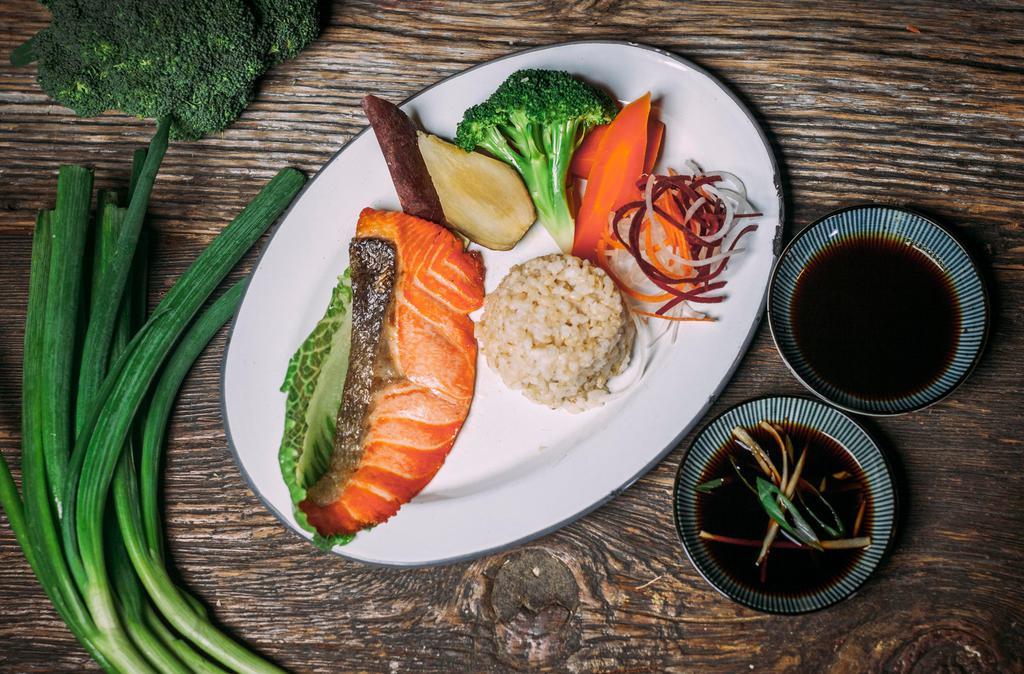 Broiled Wild-Caught Fish · Served with brown rice and a side of steamed vegetables.