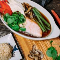 Steamed Wild-Caught Fish · In ginger tamari kombu broth, with carrots, tofu, shiitake, and string beans. Served with br...