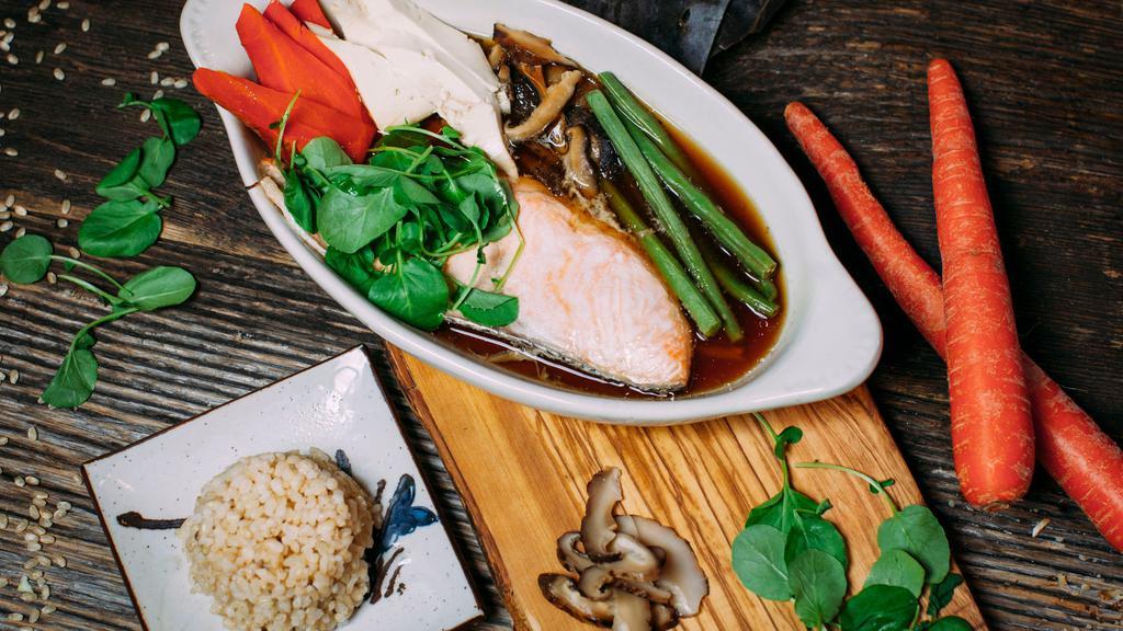 Steamed Wild-Caught Fish · In ginger tamari kombu broth, with carrots, tofu, shiitake, and string beans. Served with brown rice.