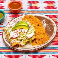 Tacos Dorados (Flautas) · Four crispy tortillas rolled and filled with meat of choice topped with lettuce, tomato, rad...