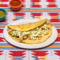 Quesadilla Grande · large handmade corn tortilla filled with oaxaca cheese and meat or vegetable of choice comes...