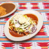 Enchiladas  · Choice of sauce served over 4 rolled tortillas filled with Oaxaca cheese topped with choice ...