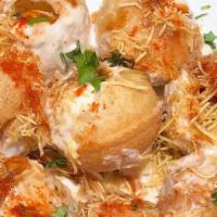 Vegetarian Dahi Puri · Crispy wheat shell filled with savory potato mash, yogurt & cilantro. Contains gluten .