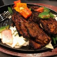Lamb Chop (Rice Not Included) · Grilled lamb ribs.