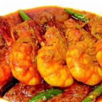 Chingri Malaikari Gravy (Rice Not Included) · Tiger shrimp cooked in coconut milk.