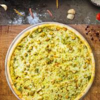 Pesto Pizza · Pesto, tomatoes, and cheese baked in an oven