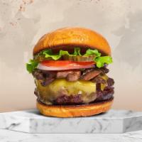 Mushroom & Swiss Cheese Burger · American beef patty topped with mushrooms, melted cheese, buttered lettuce, tomato, onion, a...