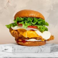 Cheese Chicken · Cheddar, mozzarella, fried chicken breasts, lettuce, tomato, red onion, mayo, ketchup on a w...