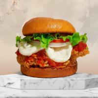 Fried Chicken Parmesan · Chicken parmesan sandwich topped with mozzarella cheese and marinara sauce.