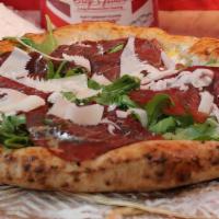 Giorgia · Fresh mozzarella, sliced bresaola marinated in lemon vinaigrette, dressing, arugula, shaved ...