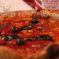 Puttanesca · Tomato sauce, anchovies, Gaeta olives, garlic and oregano