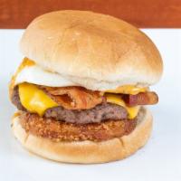 Weekender · Beef patty, crispy bacon, hash brown, fried egg, American cheese and aioli sauce.