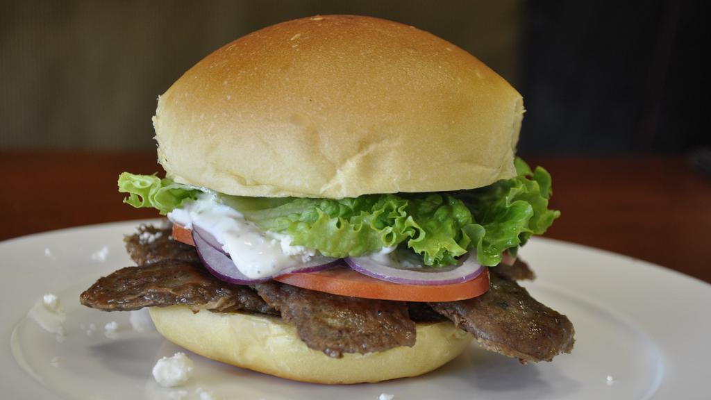 Astoria · Seasoned gyro-styled beef slices, lettuce, tomatoes, red onions, feta cheese and homemade tzatziki sauce.