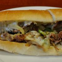 Philly Cheese Steak · Thinly sliced beef steak topped with American cheese, sautéed mushroom, onions and green pep...