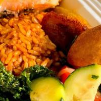 Grilled Salmon Plate · Grilled Salmon with Hot Honey Sauce, Plantains, Salad, Jollof Rice and Akara