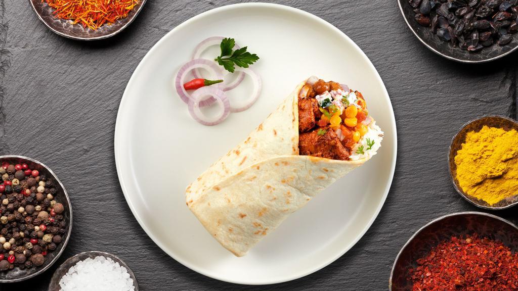 Chick'S Tikka Masala Burrito · Chicken sauteed with bell pepper and onion in a spiced tomato sauce wrapped in a warm Naan.