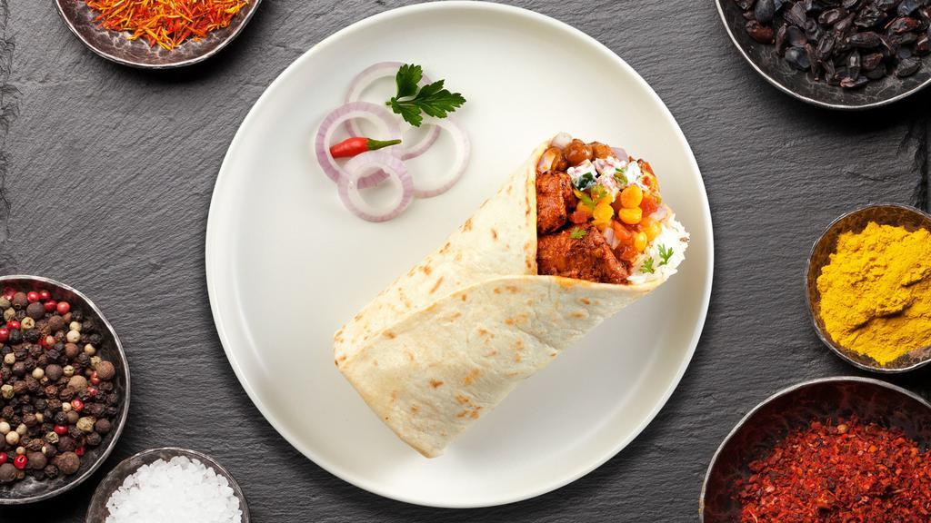 Chick'S Just Masala Burrito · Chicken seasoned with chilly in a lemon spiced sauce wrapped in a warm Naan.