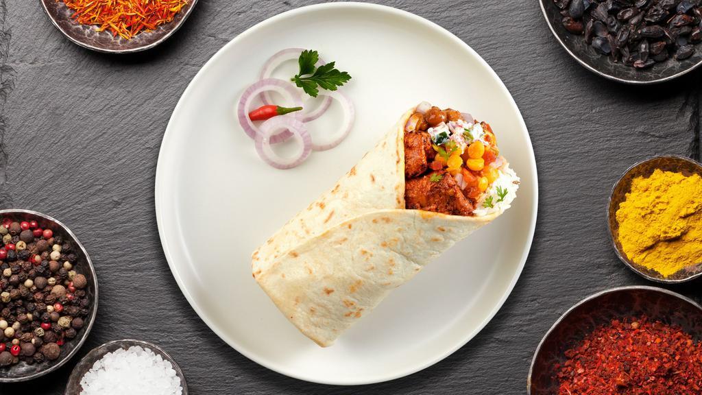 Chick Victim Vindaloo Burrito · Boneless chicken pieces and potato cooked in onion and tomato sauce served over Basmati rice.