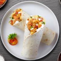 Tikka Away My Shrimp Burrito · Shrimp sauteed with bell pepper and onion in a spiced tomato sauce wrapped in a warm Naan.