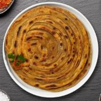 Lachha Paratha · Whole wheat layered bread with ajwain and coriander.