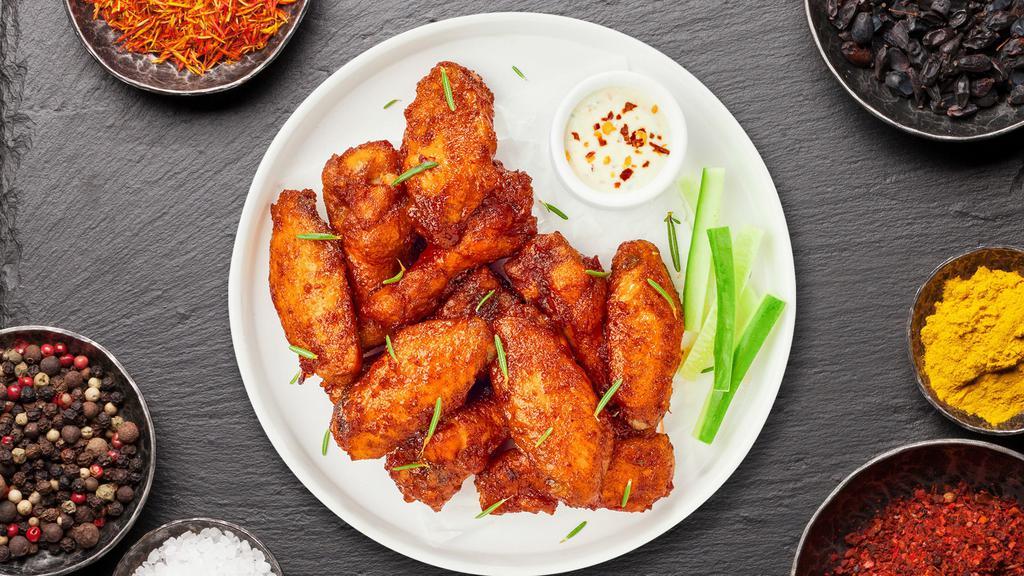 Take The Heat Wings · (Seven pieces) Fresh chicken wings breaded and fried until golden brown and tossed in spicy sauce.