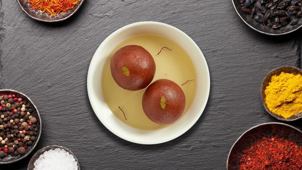 Gulab Jamun · Indian favorite dessert with fried milk solids in a natural honey dressing.