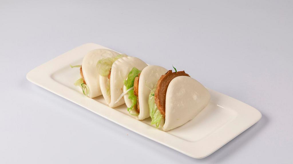 Steamed Pork Buns · 6 hours braised pork belly cucumber scallion with house special sauce. 1pc