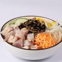 Yuzu Albacore Bowl · Seared albacore tuna, sweet onion, cucumber, mango, crab salad, hijiki seaweed, avocado, yuz...