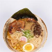 Tonkotsu Miso Ramen · Chashu pork, egg, scallion, corn, bamboo shoots, woodear, seaweed, sesame seeds, fish cake.