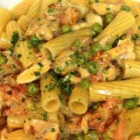 Rigatoni With Grilled Chicken & Peas In Vodka Sauce · 