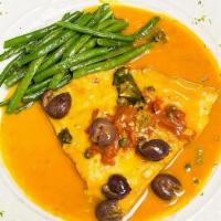 Red Snapper · Sauteed with capers, gaeta olives and squashed tomato. Served with string beans.
