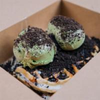 Matcha Ice Cream Waffle · Waffles are better with green tea ice cream, crushed Oreos, dark chocolate drizzle, and cond...