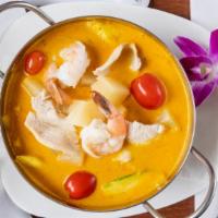Mango Curry · Spicy. Chicken and shrimp in yellow curry with pineapple, tomato, zucchini, and mango.