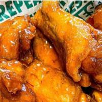 Haswell Famous Wings · Famous Wings tossed in housemade wing sauce