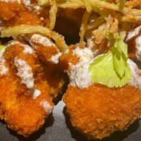 Cauliflower Buffalo Bites · Tossed in chefs homemade buffalo sauce with side blue cheese