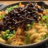 Mac N' Cheese · Contains nuts. Cashew cheese sauce, numu mozzarella, elbow macaroni, smoked paprika, and her...