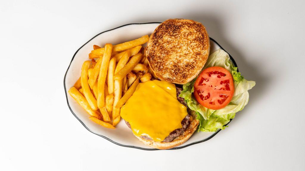 Deluxe Cheeseburger · American, swiss, cheddar or mozzarella. Deluxe cheeseburger is served with french fried potatoes, lettuce, tomato, pickle and coleslaw.