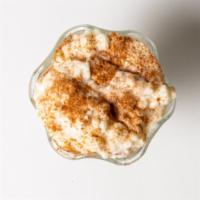 Rice Pudding · Served with whipped cream.