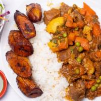Carne Guisada · Beef  stew served with rice and fried sweet plantains.