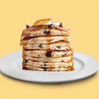 Bg03A. Chocolate Chip Pancakes (3 Stack) · Fluffy golden pancakes with chocolate chips, served with butter and syrup.
